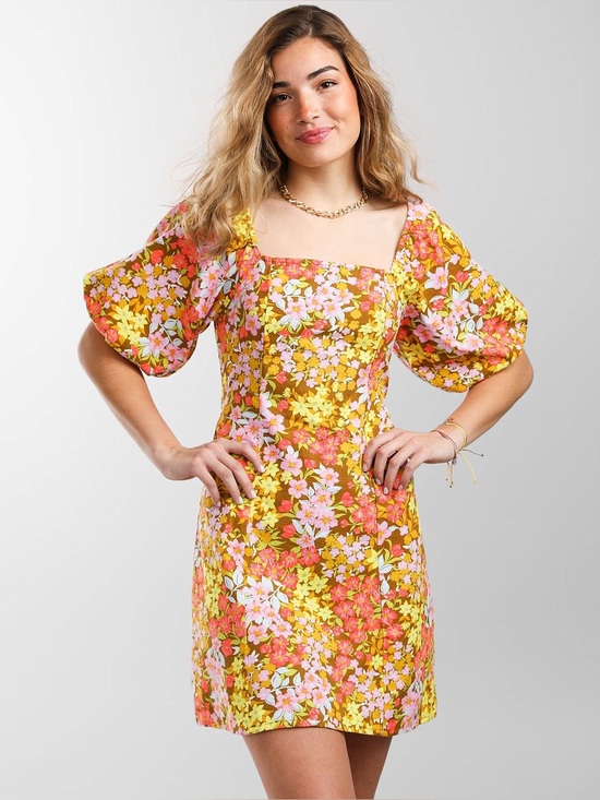 Billabong Dresses & Skirts - Billabong Paradise Mini Dress in a floral print with puff sleeves Small Summer
